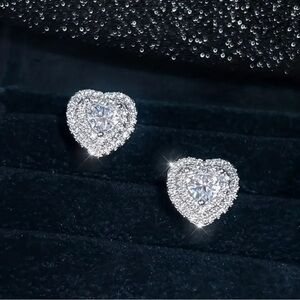 Pair of 0.3CT Moissonite and 925 Sterling Silver earrings.